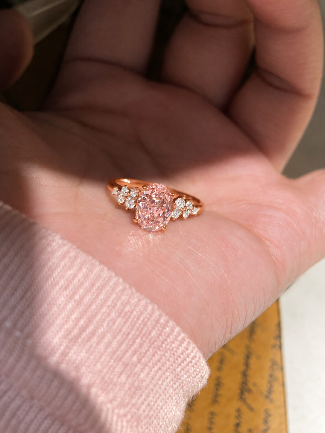 Oval Pink Moissanite Engagement Ring with Floral Side Stones
