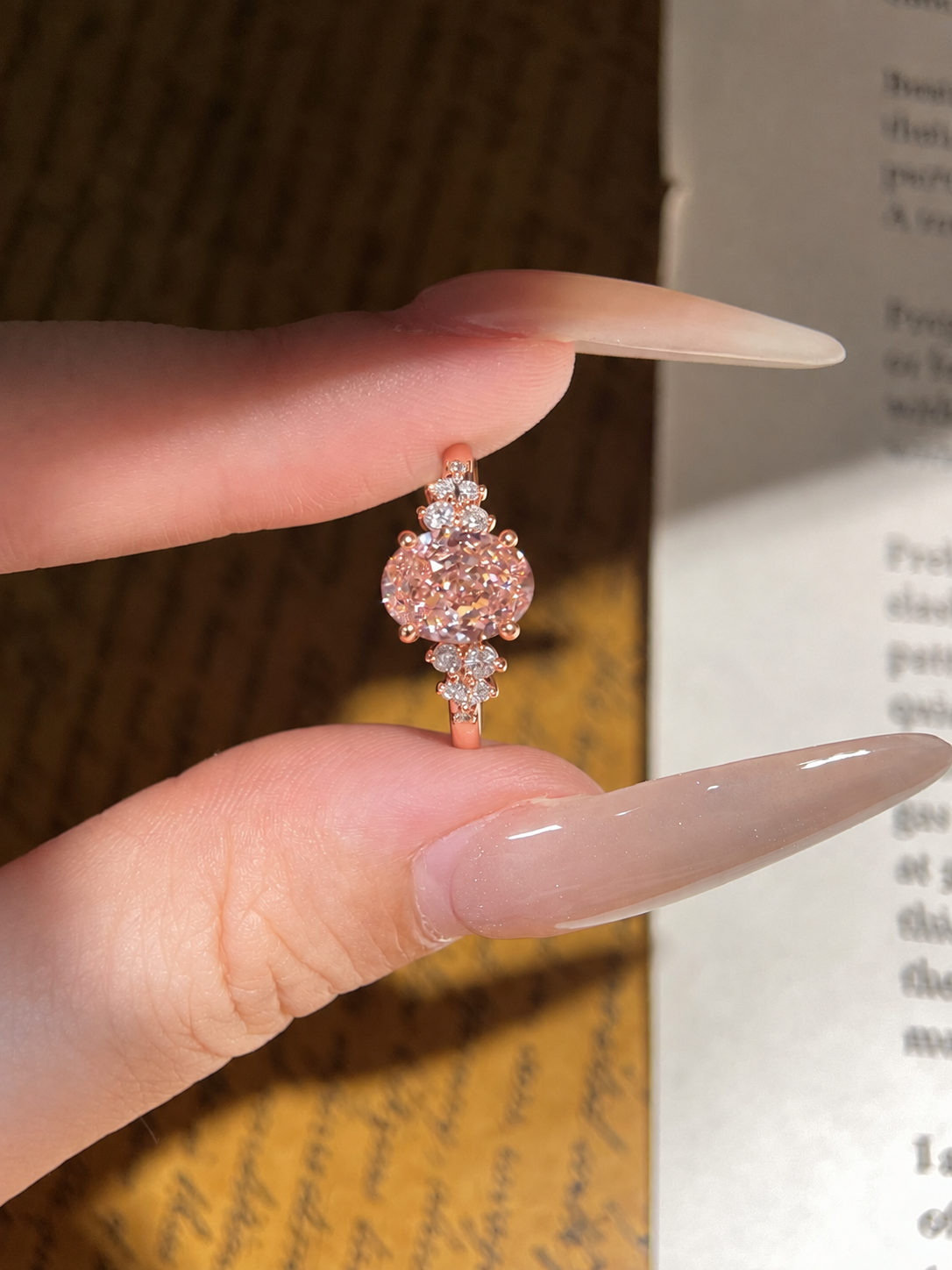Oval Pink Moissanite Engagement Ring with Floral Side Stones