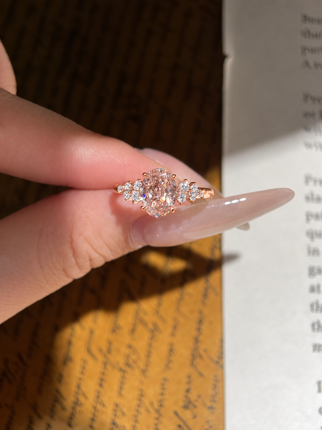 Oval Pink Moissanite Engagement Ring with Floral Side Stones