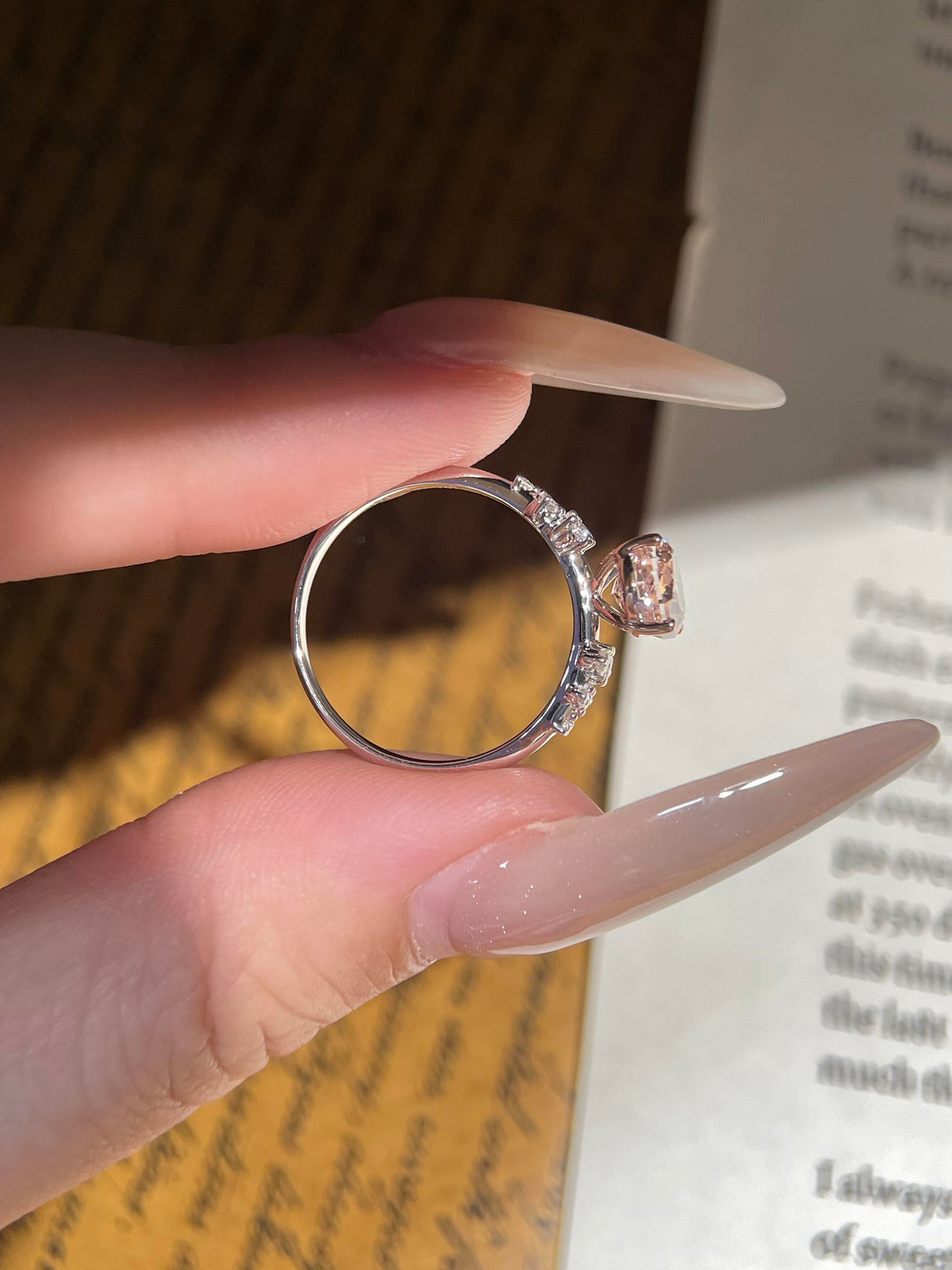 Oval Pink Moissanite Engagement Ring with Floral Side Stones
