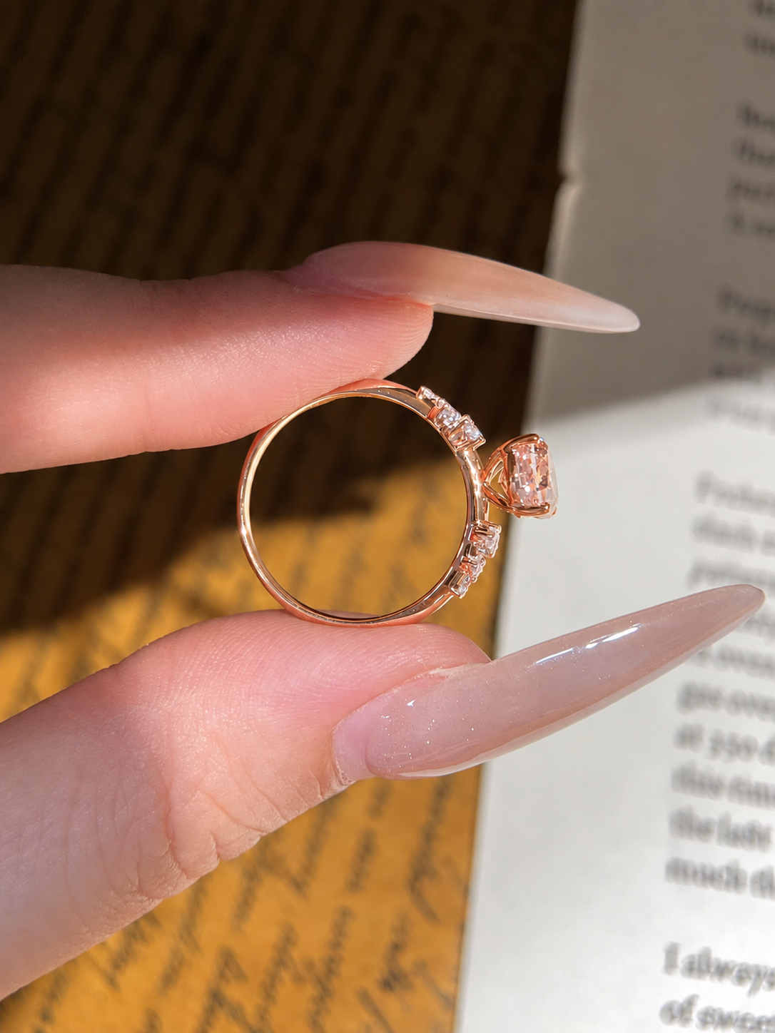 Oval Pink Moissanite Engagement Ring with Floral Side Stones