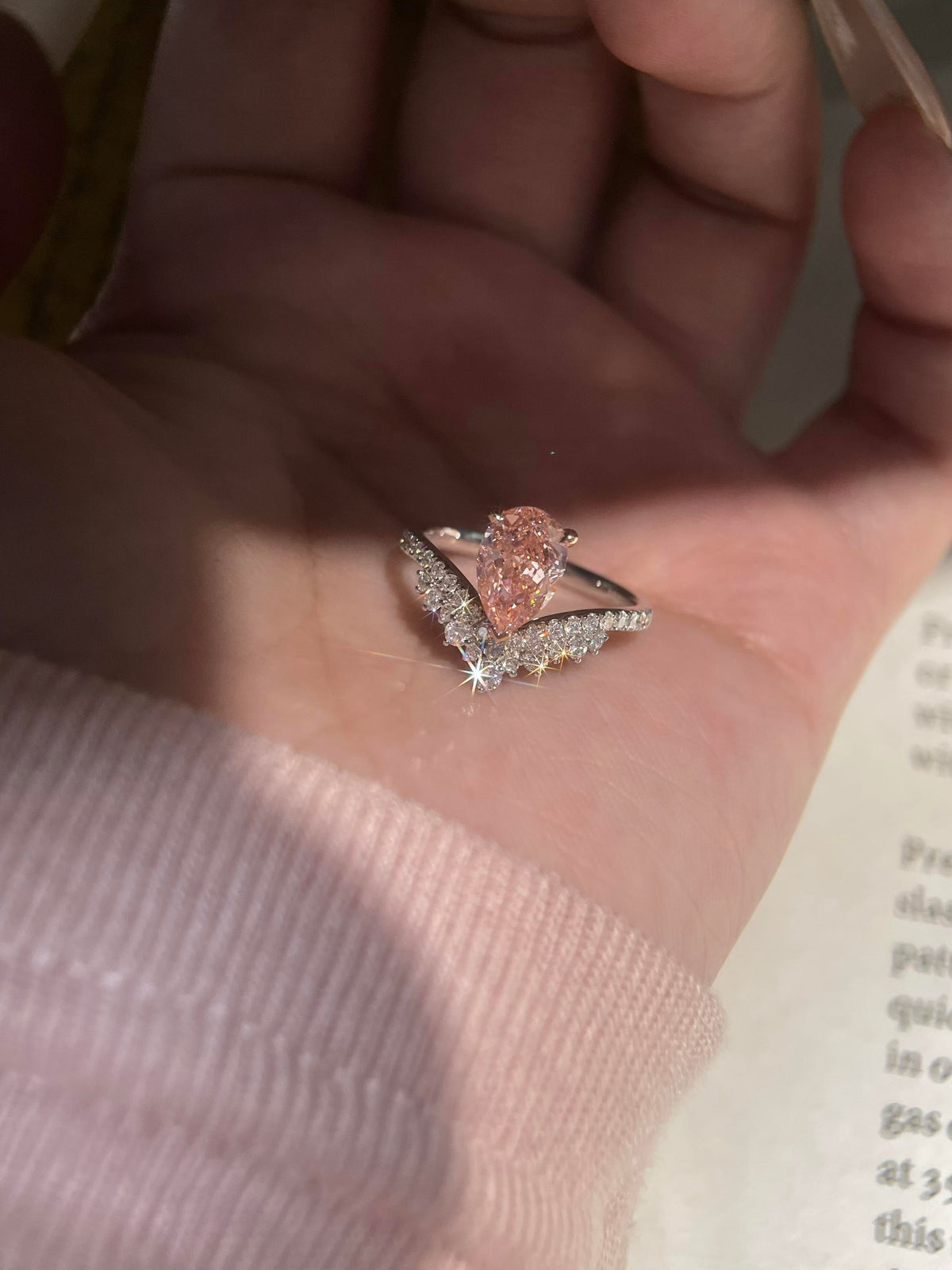 Pear Shaped Pink Moissanite Engagement Ring with Curved Diamond Band