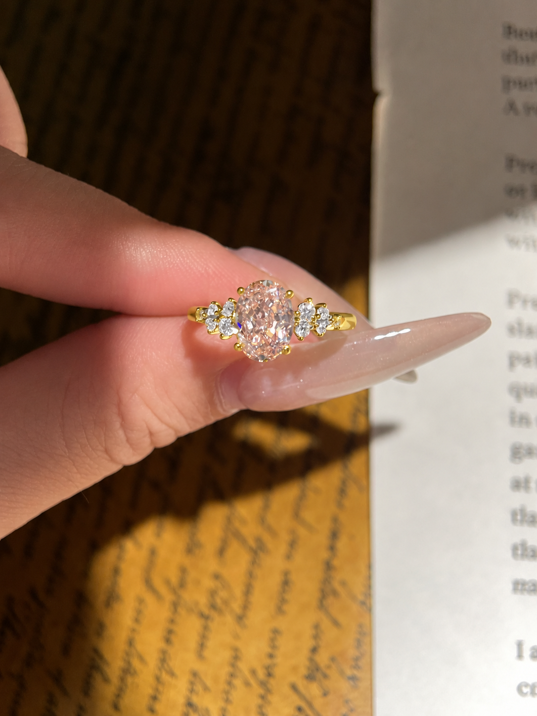 Oval Pink Moissanite Engagement Ring with Floral Side Stones