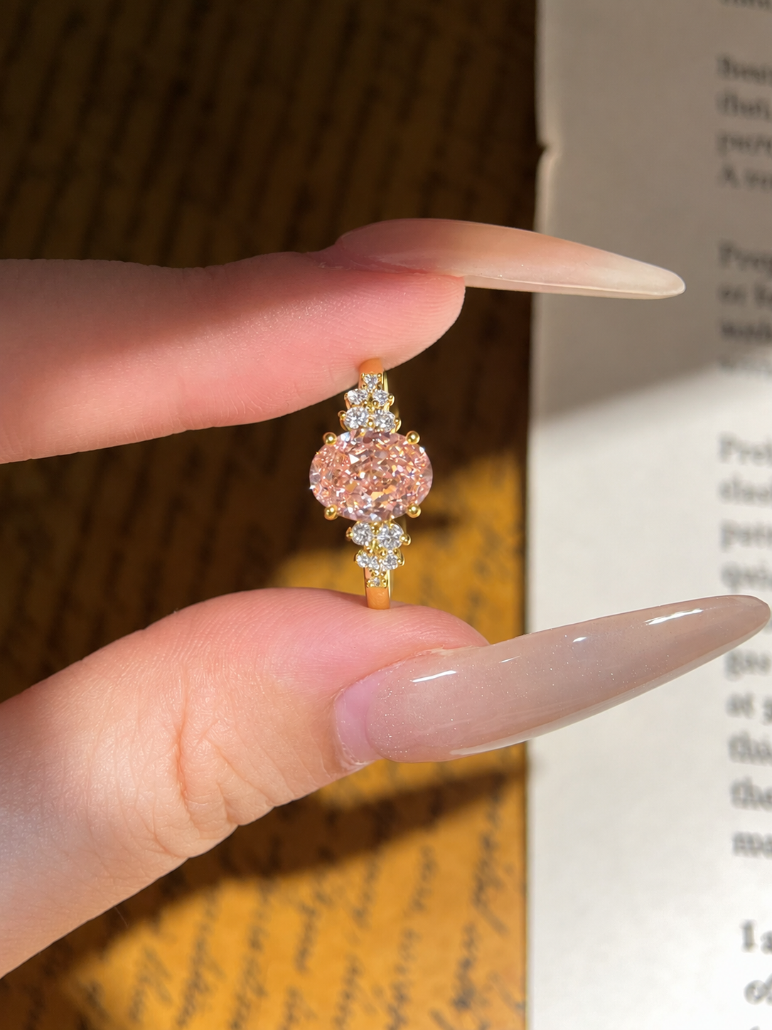 Oval Pink Moissanite Engagement Ring with Floral Side Stones