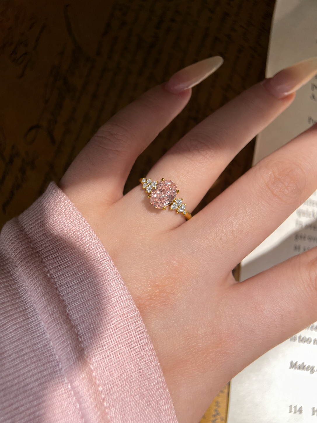 Oval Pink Moissanite Engagement Ring with Floral Side Stones